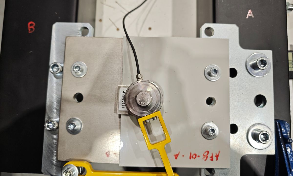 Axial load-cell test for bolted cover joint
